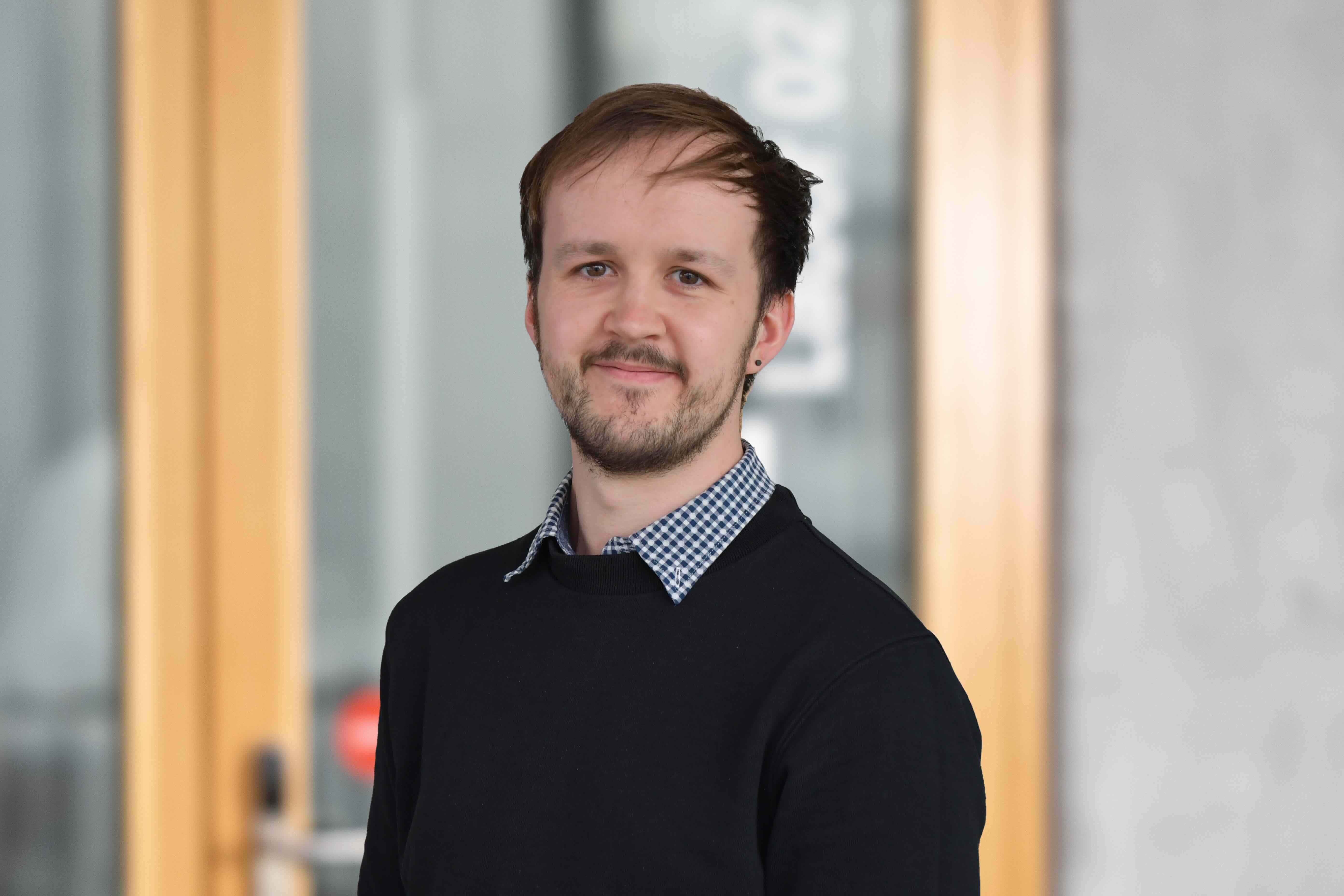 Headshot of Dr Jake L. Greenfield